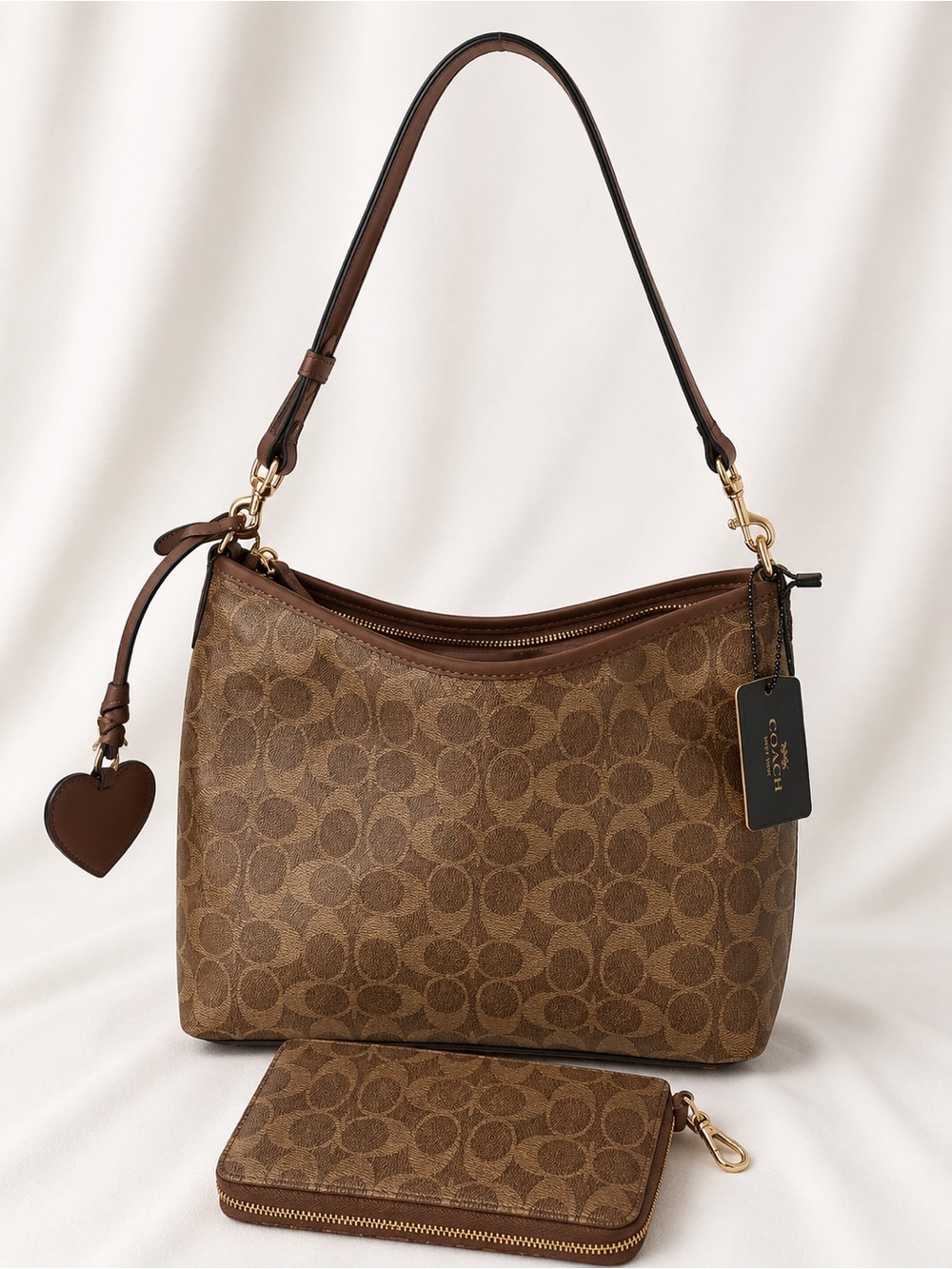 Coach Brown Signature Canvas Shoulder Bag with Heart Charm